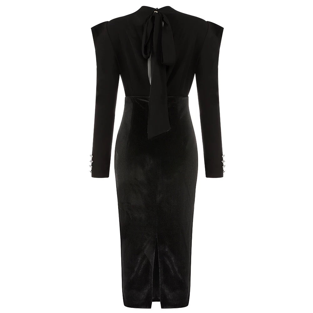 A midi dress comprising a velvet skirt with a draping high neck