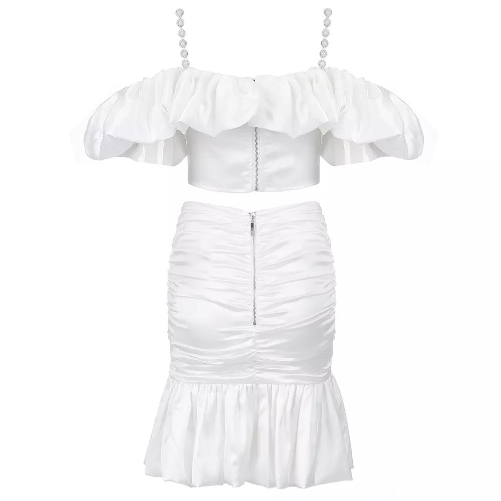 Off the shoulder crop and sparkly pearl straps with a matching ruffle skirt