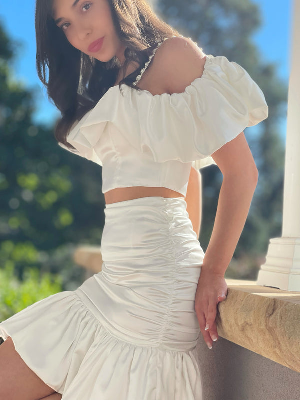 Off the shoulder crop and sparkly pearl straps with a matching ruffle skirt
